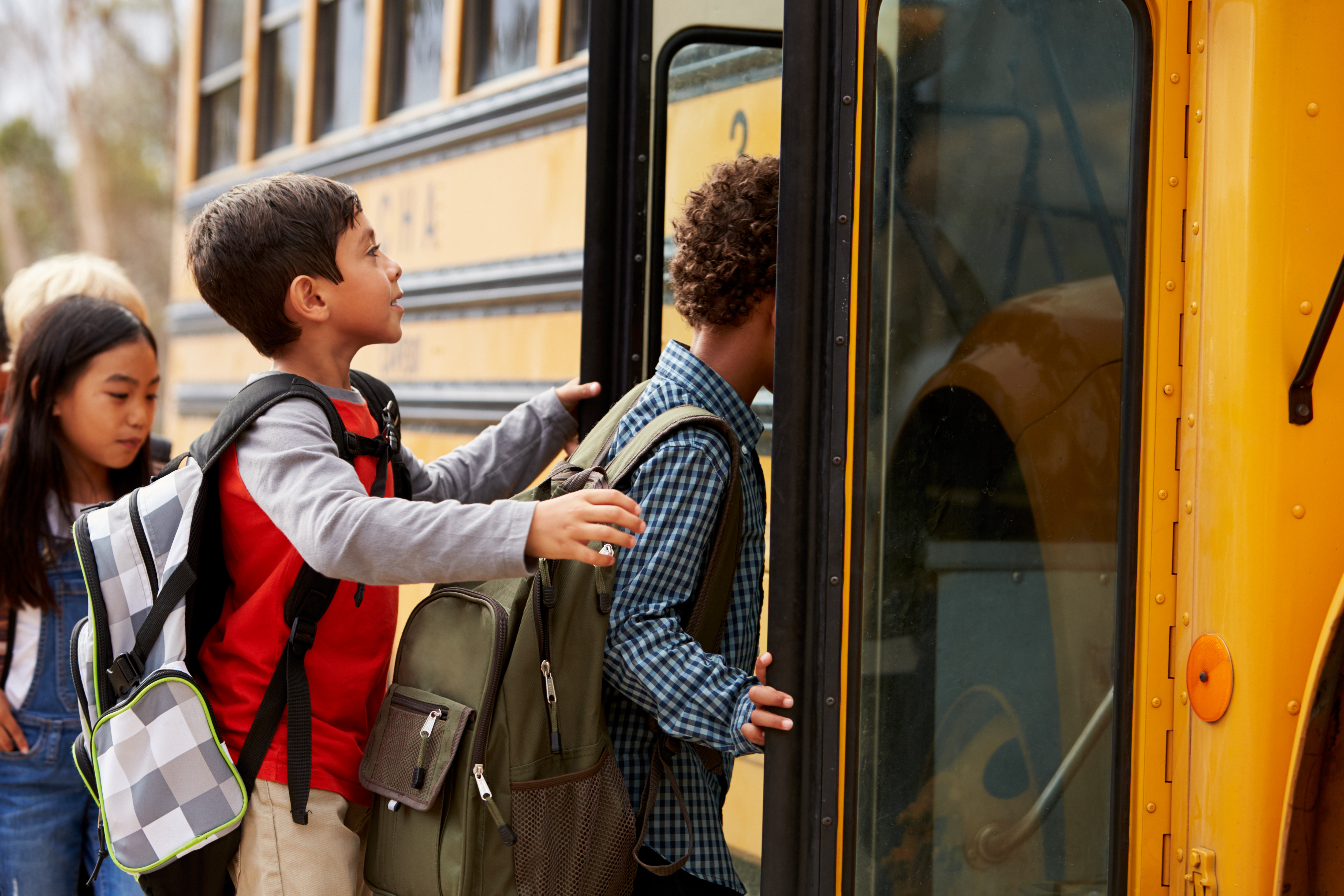Students entering school bus