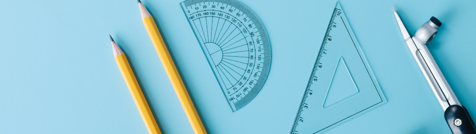 Pencils and protractors on a surface