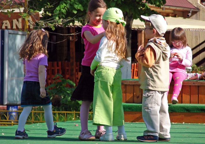 young children outside playing