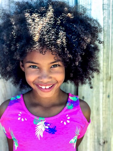 young girl smiling