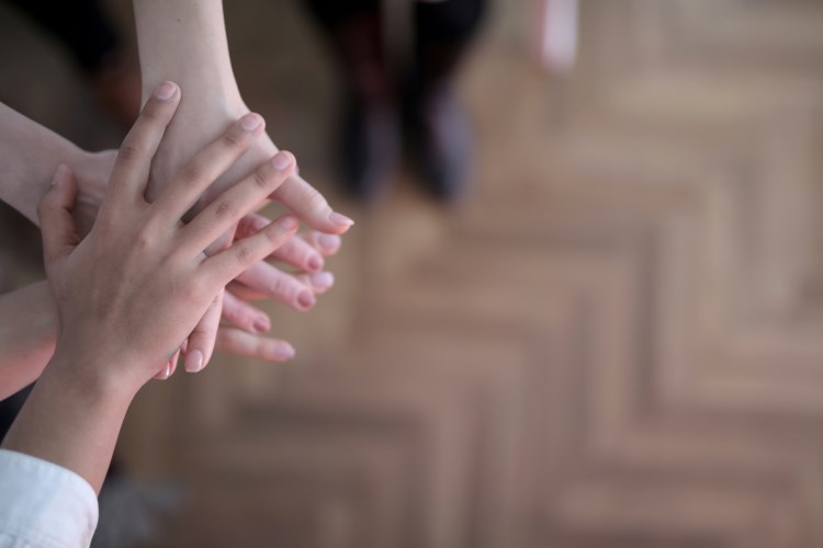 Children hands on top of each other