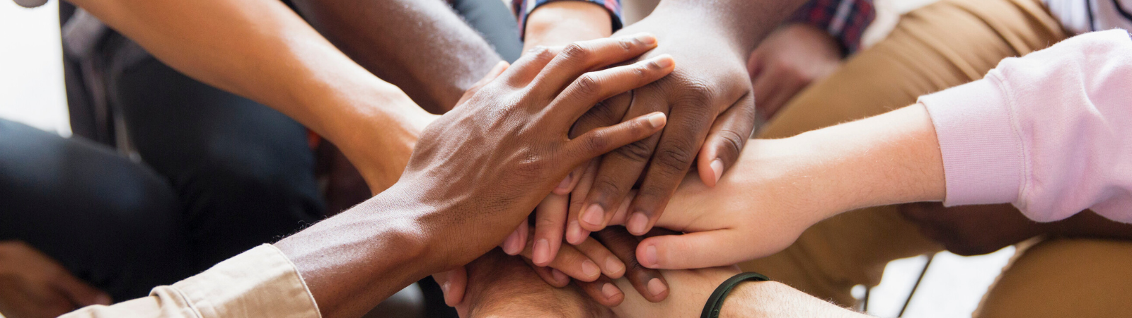 People holding their hands together