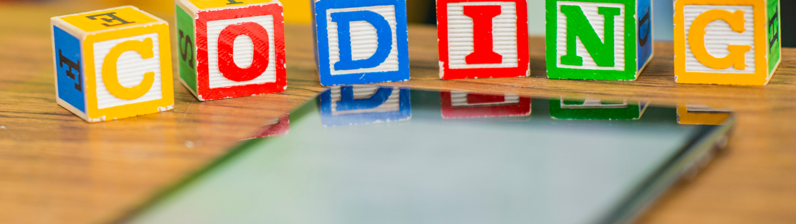 Coding written on children's blocks