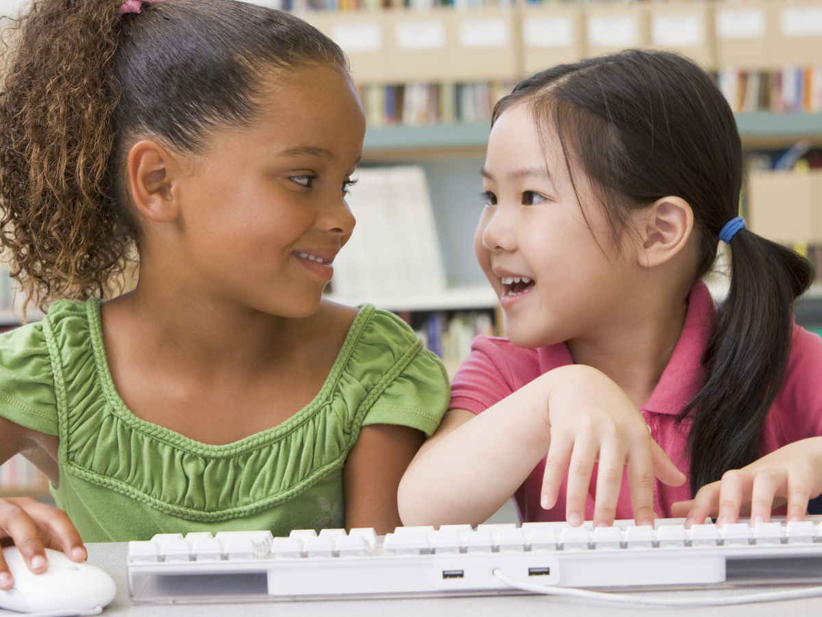 Two students sitting at desk