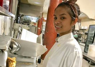 student in kitchen