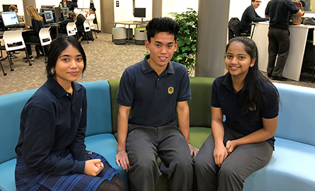 Three students in Learning Commons at school