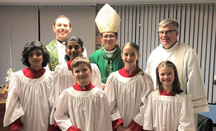 Children with Cardinal, Bishop and priests