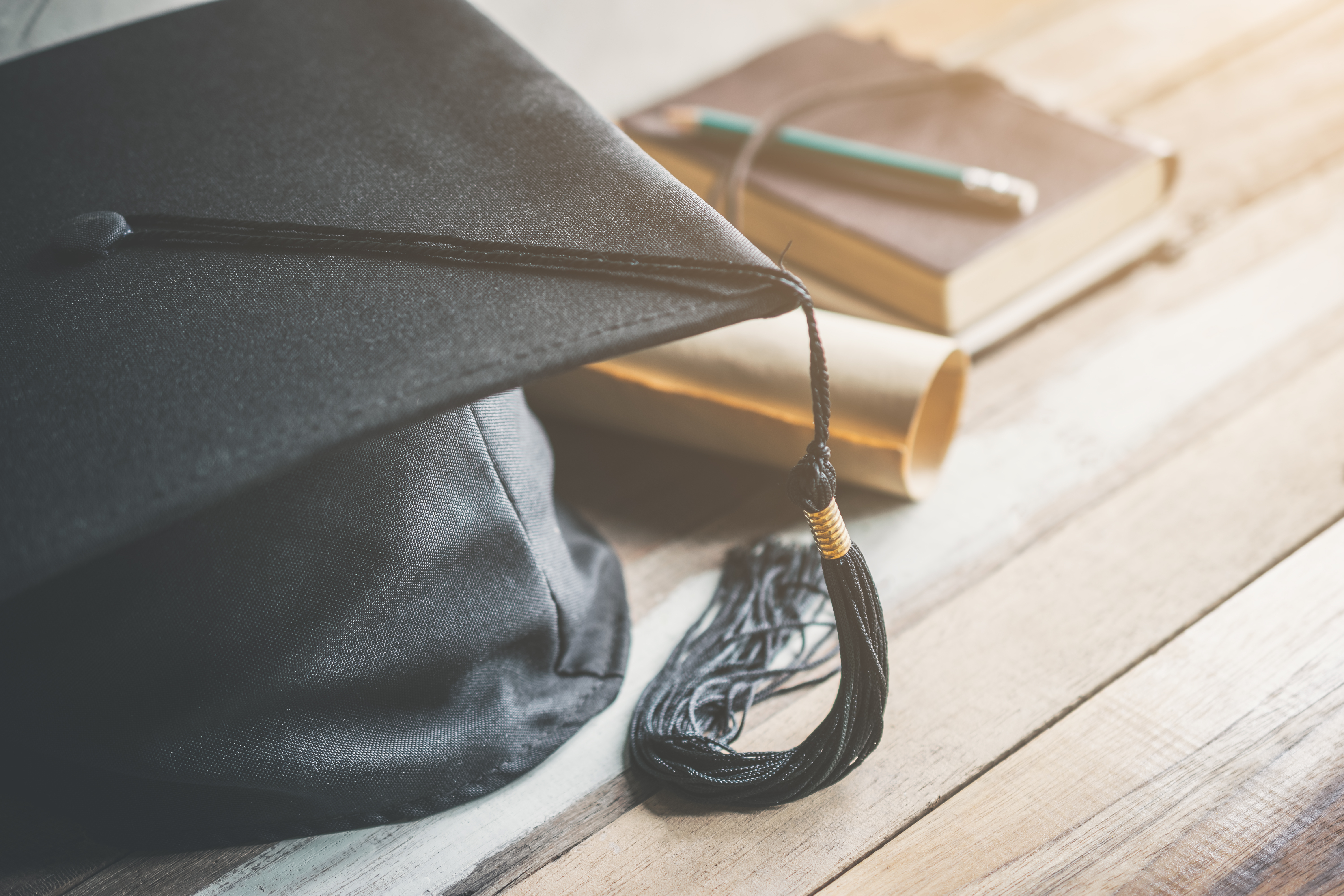 graduation cap and diploma