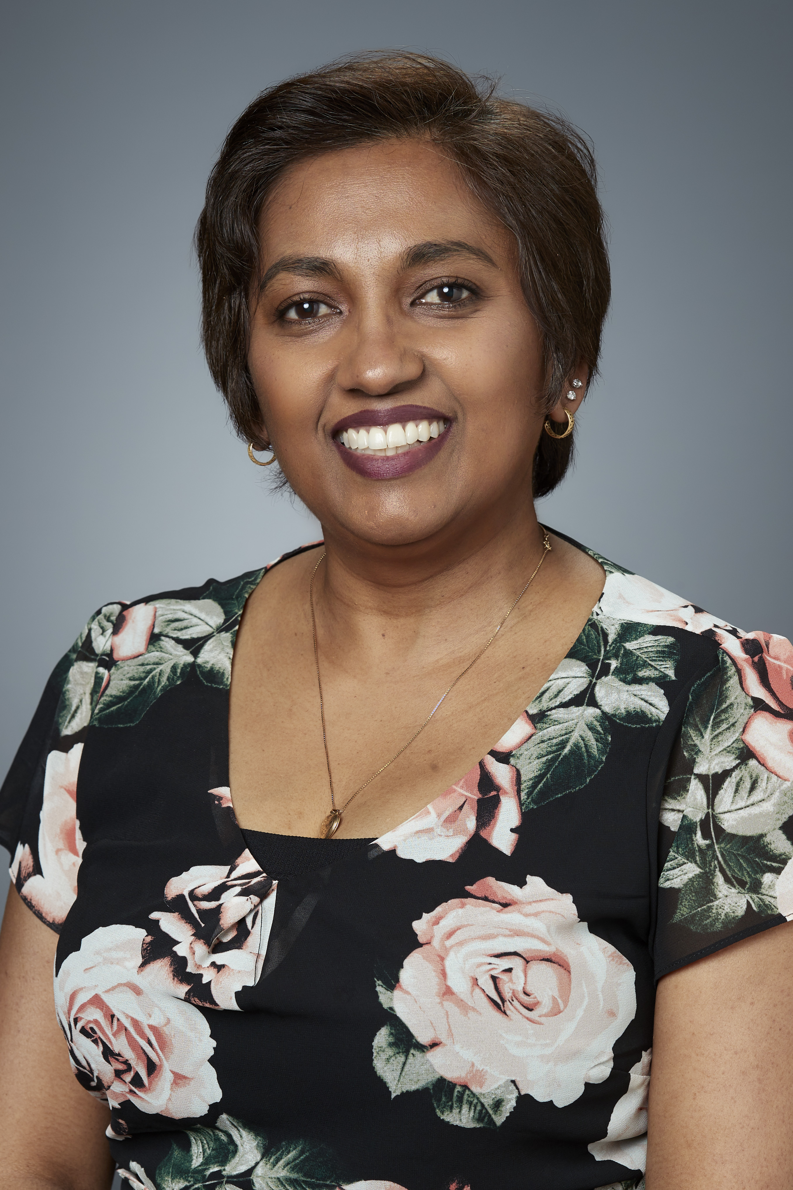 Photograph of a woman smiling