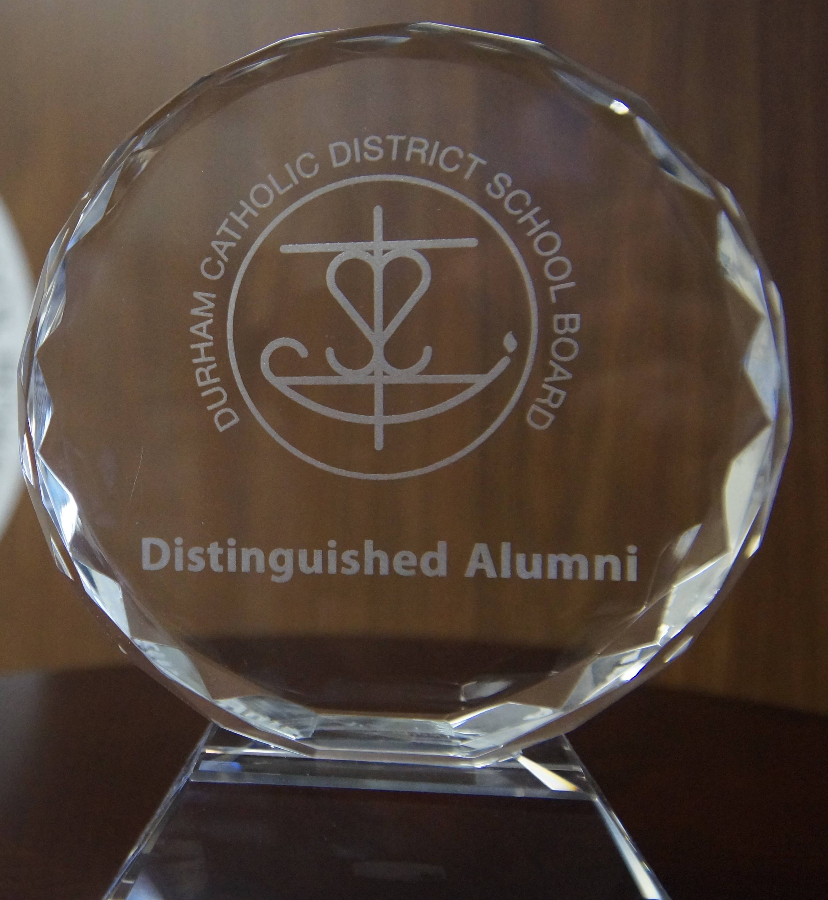 Distinguished Catholic Alumni glass trophy
