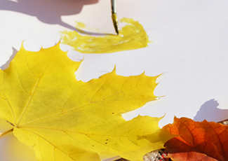 hand painting a leaf