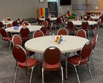 Tables with Pride flags on them