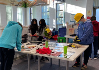 Students trying different professions in a workshop