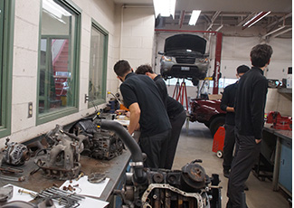 Male students in an auto classroom