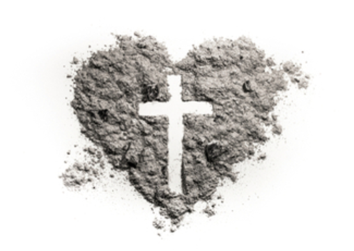 Ashes shaped into a heart with a cross in the center