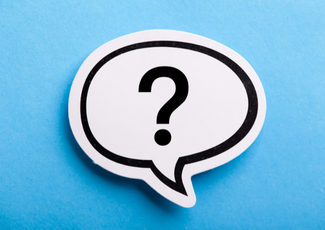question mark in a speech bubble over a blue background