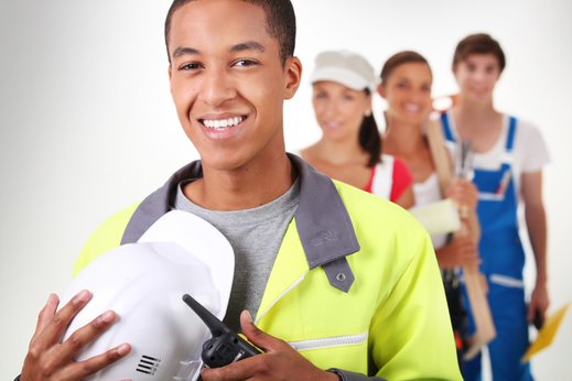 male adult holding a hard hat