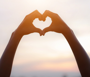 Hands shaped into a heart