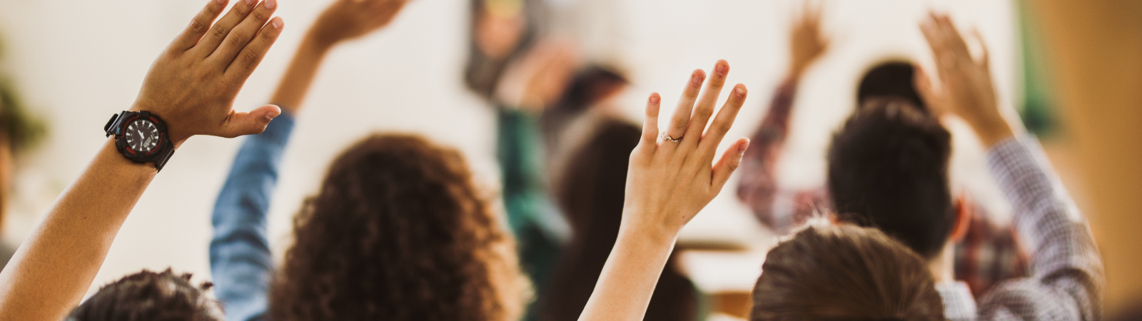 parents raising hands for questions