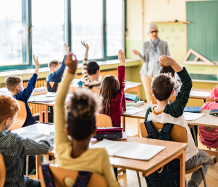 Students raising hands