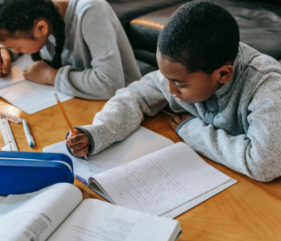 Young boy doing homework