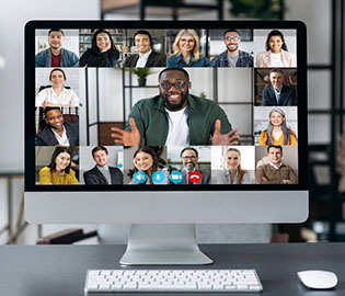 Adults participating in a virtual meeting on a computer screen