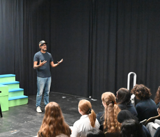Author David Robertson on stage
