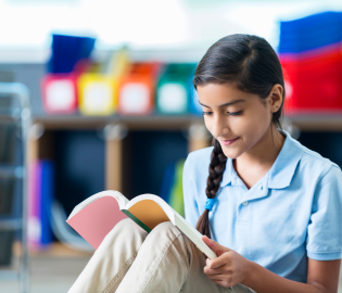 student reading book