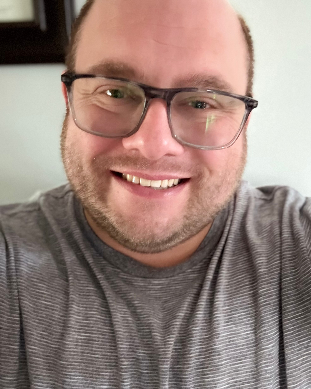 Adult male smiling