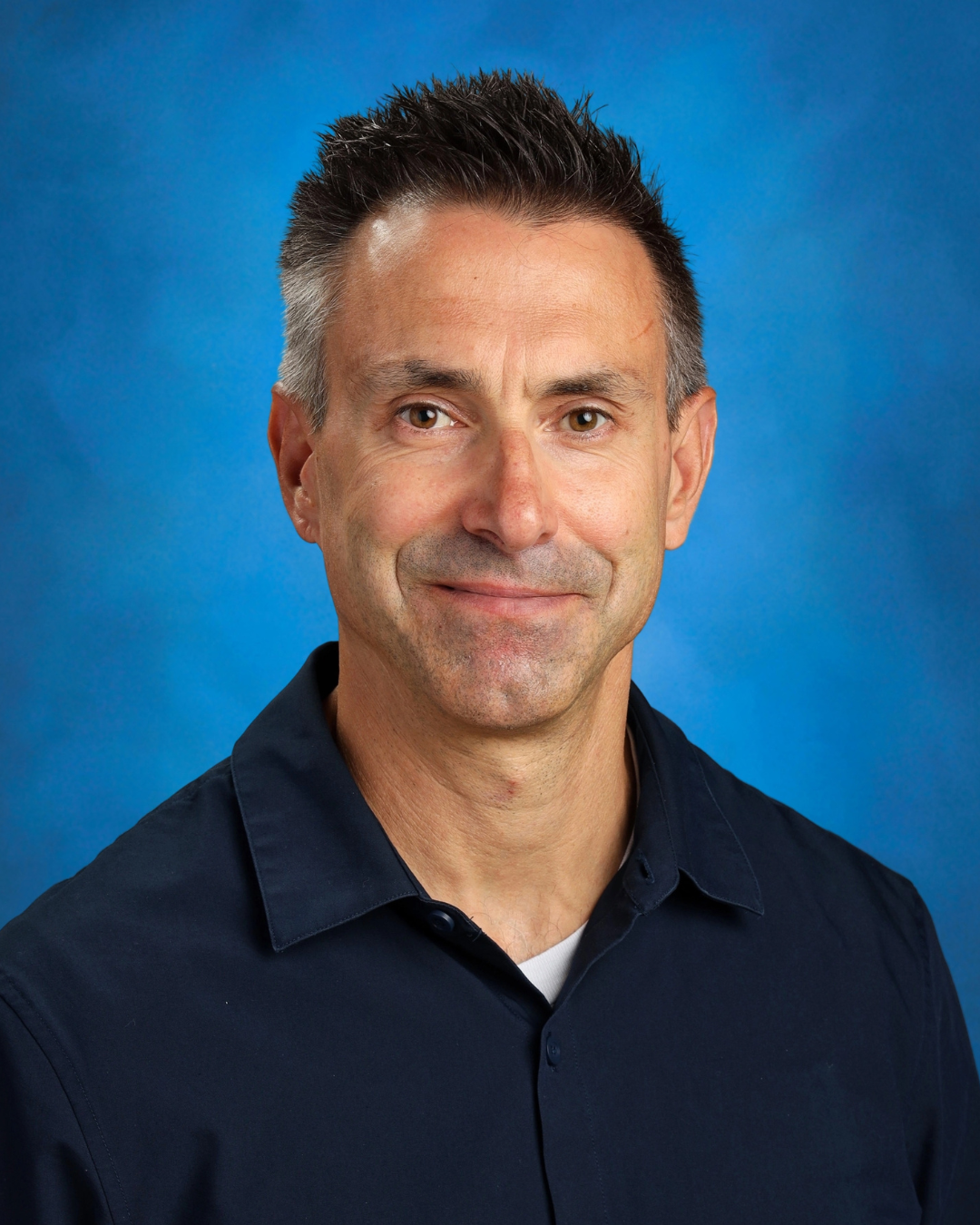 Adult male smiling
