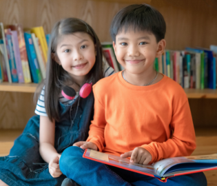 Boy and girl reading