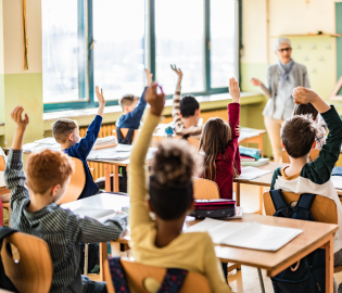 Students raising their hands