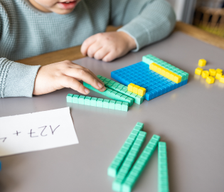 Child playing with math games