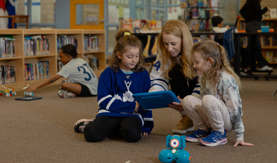 Students using coding robots