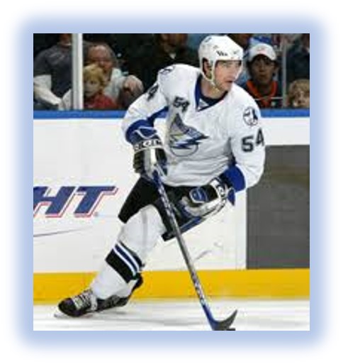 Male NHL Hockey player on ice and in uniform