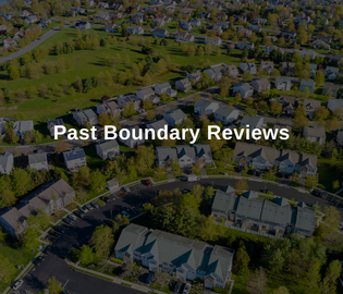 Aerial view of a neighbourhood. Overlay text reads Past Boundary Reviews