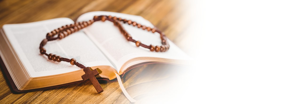 Rosary on a bible