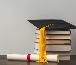 Graduation cap and books