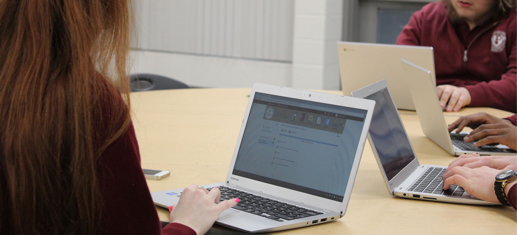 students using laptops