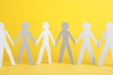 paper cut-outs of people