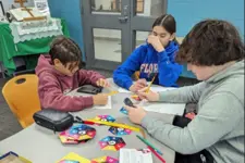 kids working together on a math project